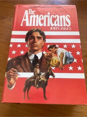 The Americans by John Jakes - Red Hardcover Novel